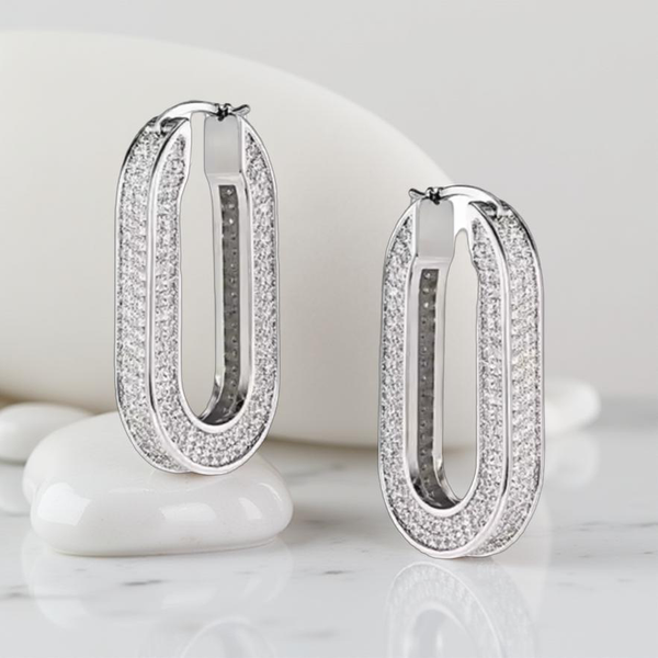 Lumière Loop – Pavéörhängen i vitguldston